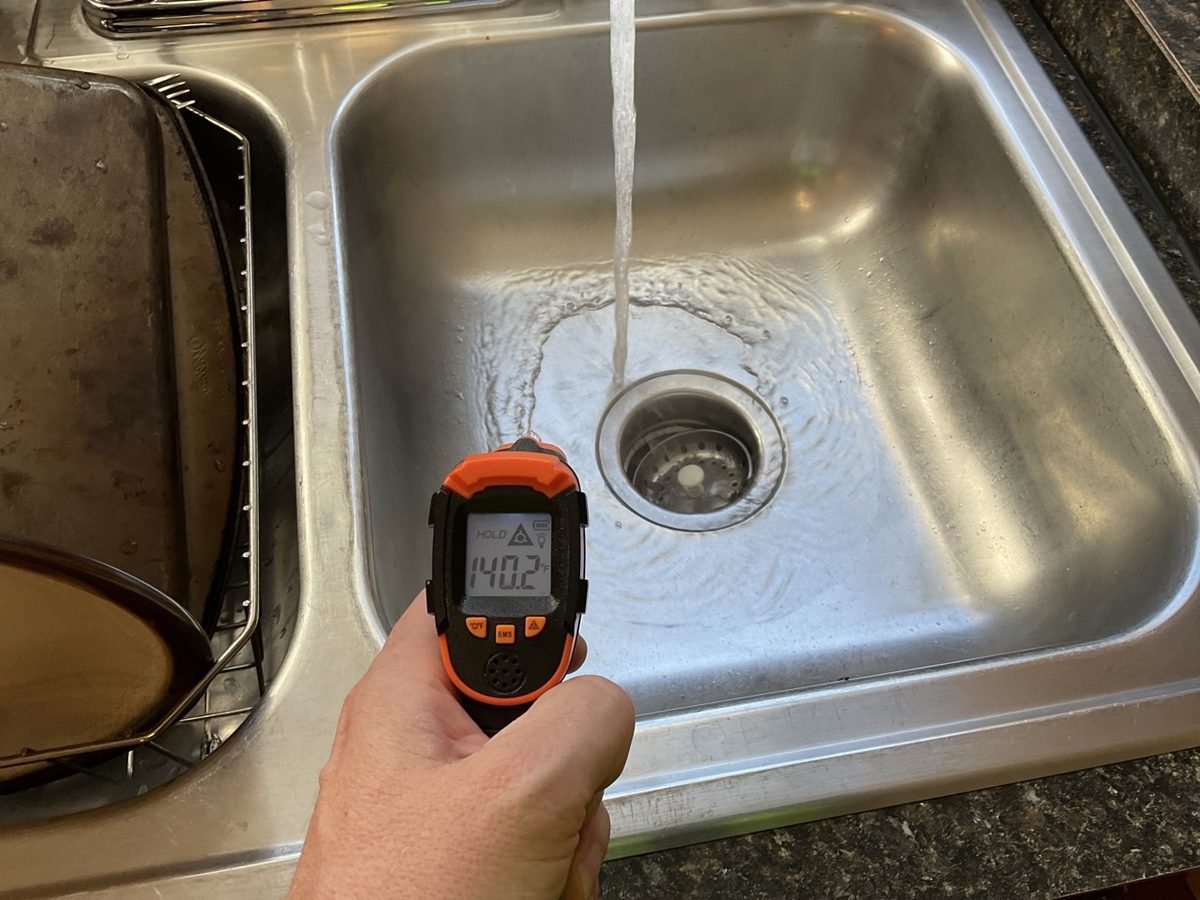 Water temperature check at a sink