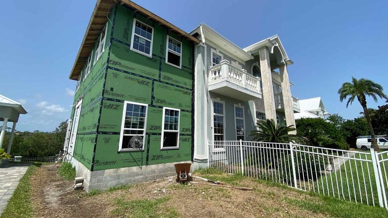Wind mitigation inspection at a home under construction with sealed sheathing, Ponte Vedra Beach, Florida
